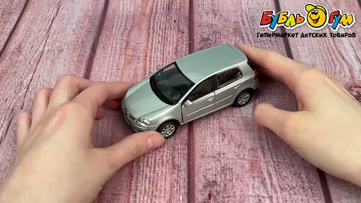 Машинка металлическая Welly Volkswagen Golf V инерционная 1:38 в ассортименте