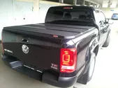 Жесткая трехсекционная крышка кузова Kramco для Volkswagen Amarok