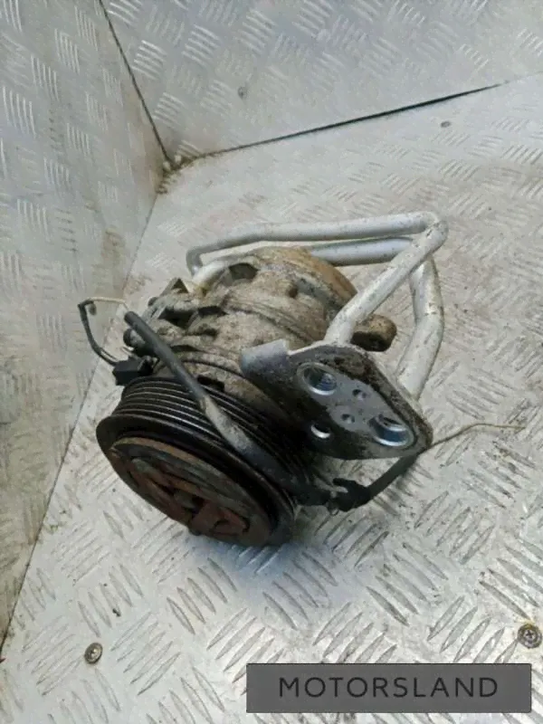 Компрессор кондиционера Volkswagen Pointer 2005г. (артикул 023-77954867)