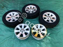 Алюминиевый литой диск VAG Volkswagen Tiguan 6.5J-R16 ET33 5x112 ЦО 57.1 c Nokian Hakkapeliitta 8 SUV 215/65/R16 102T XL
