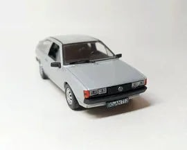 Volkswagen Scirocco (серебристый) Фольксваген