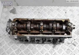 Головка блока цилиндров двигателя (ГБЦ) Volkswagen Polo (1994-1999) 53900128