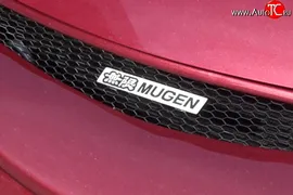 Эмблема (шильдик) решетки радиатора Mugen Volkswagen Passat B7 универсал (2010-2015)