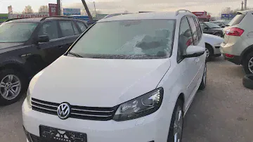 Белоснежный VW Touran 2012 года в отличном состоянии
