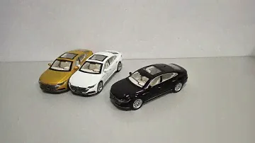 Volkswagen Passat CC модель 1:32 "Автосвіт". Металлическая звук, свет.