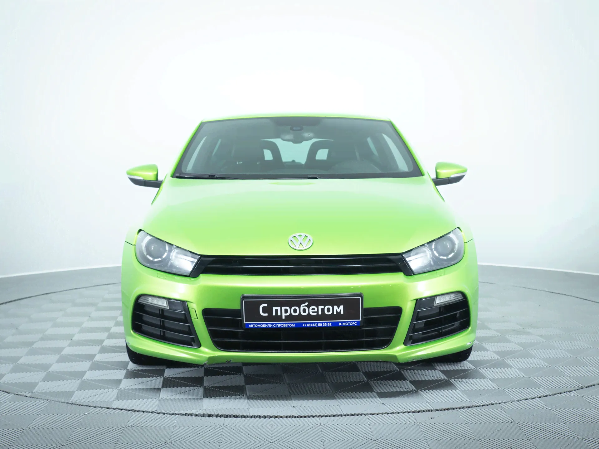 Volkswagen Scirocco 2011 (211 л. с.) зеленый-0