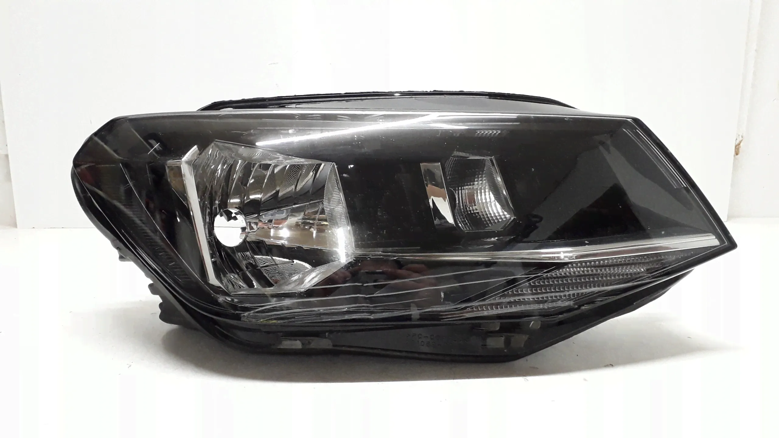 Фара правая Volkswagen Caddy 3 поколение [рестайлинг] (2010-2015), 7231319-0