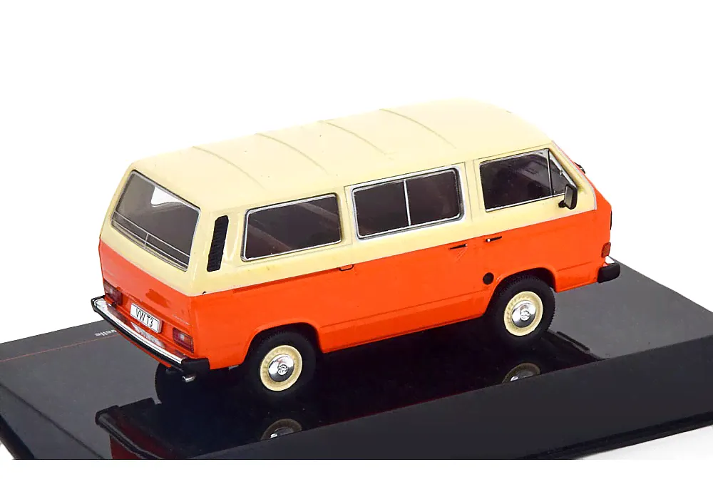 Масштабная модель 1:43 Volkswagen T3 Caravelle 1981 оранжевый с белым-1